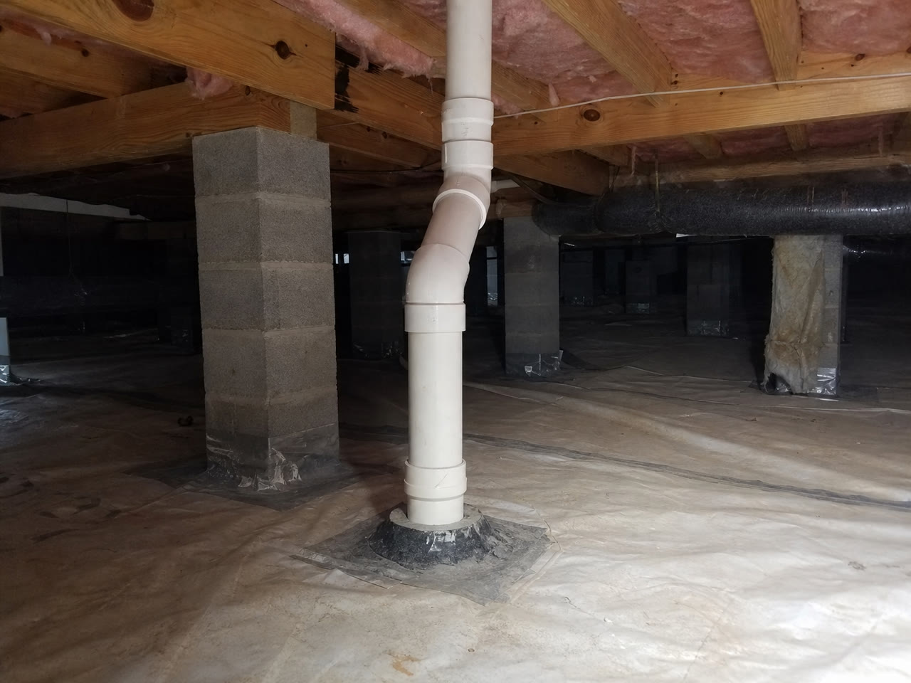 Crawlspace radon vapor barrier in an Asheville home
