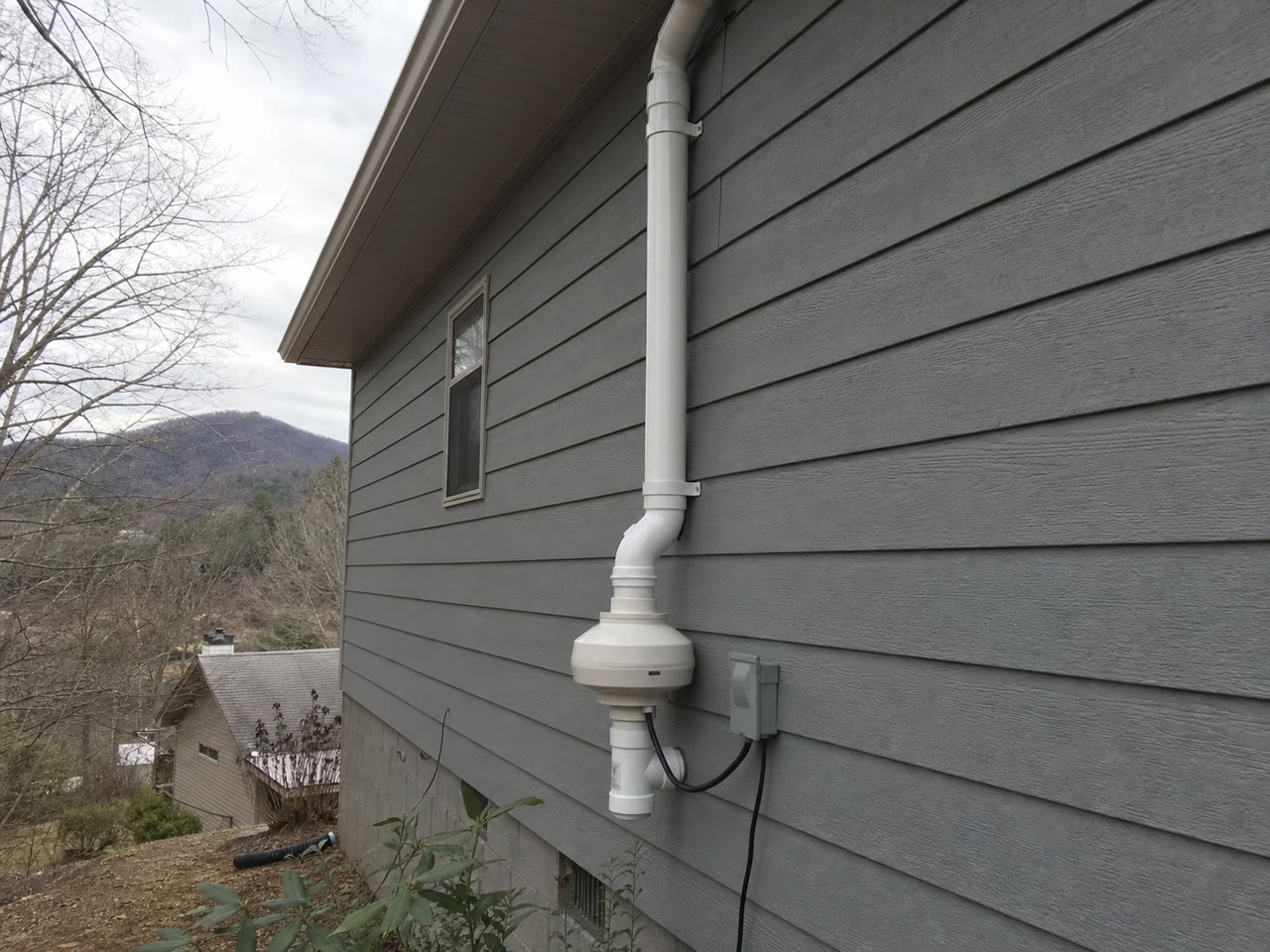 Exterior radon mitigation fan system in Asheville